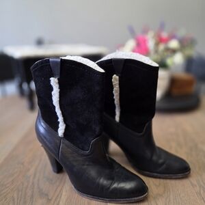 MICHAEL Michael Kors Black Heeled Boots with Modern Accents